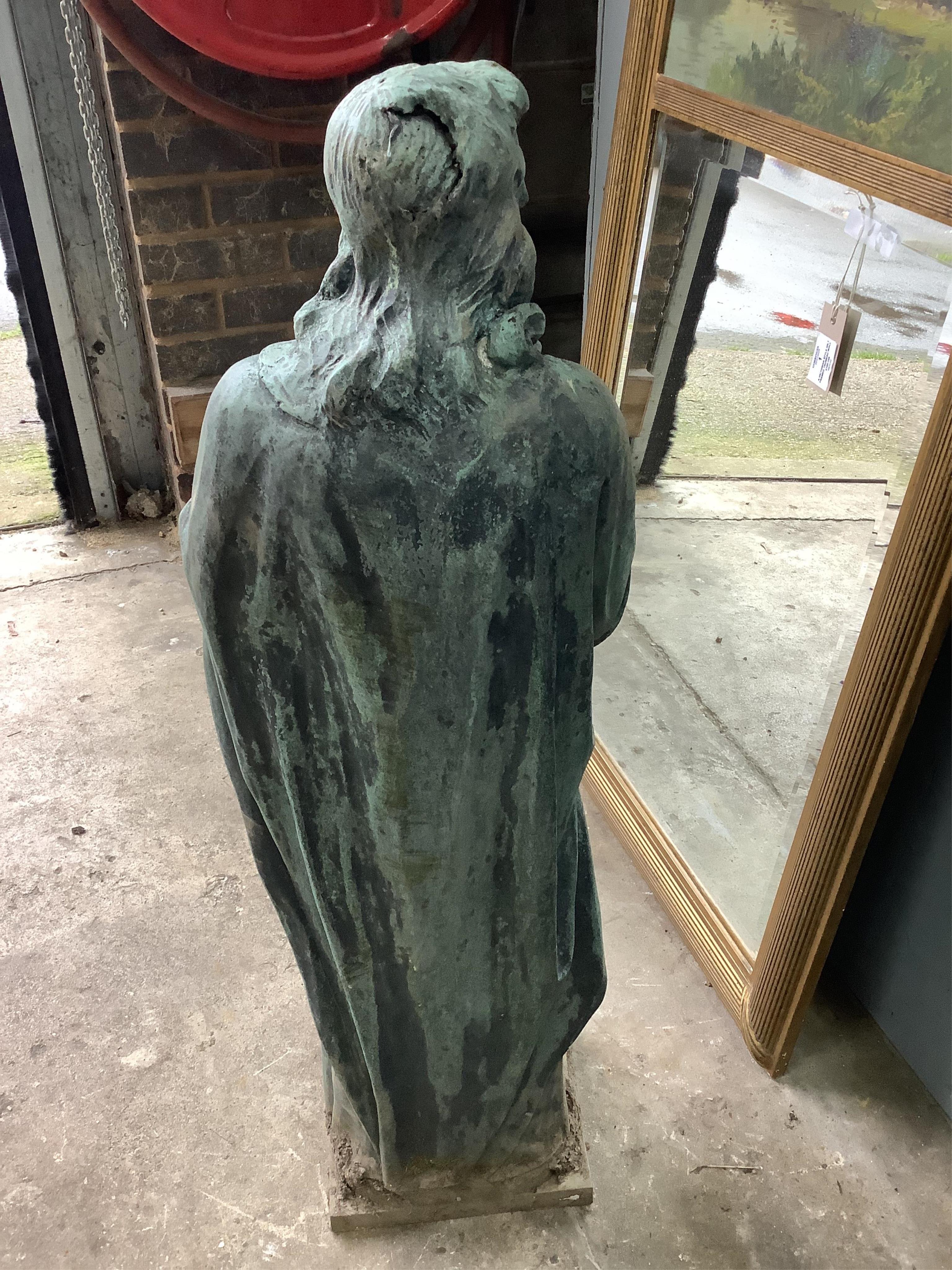 A Victorian green patinated cast iron statue of a saint in prayer, height 92cm. Condition - poor to fair